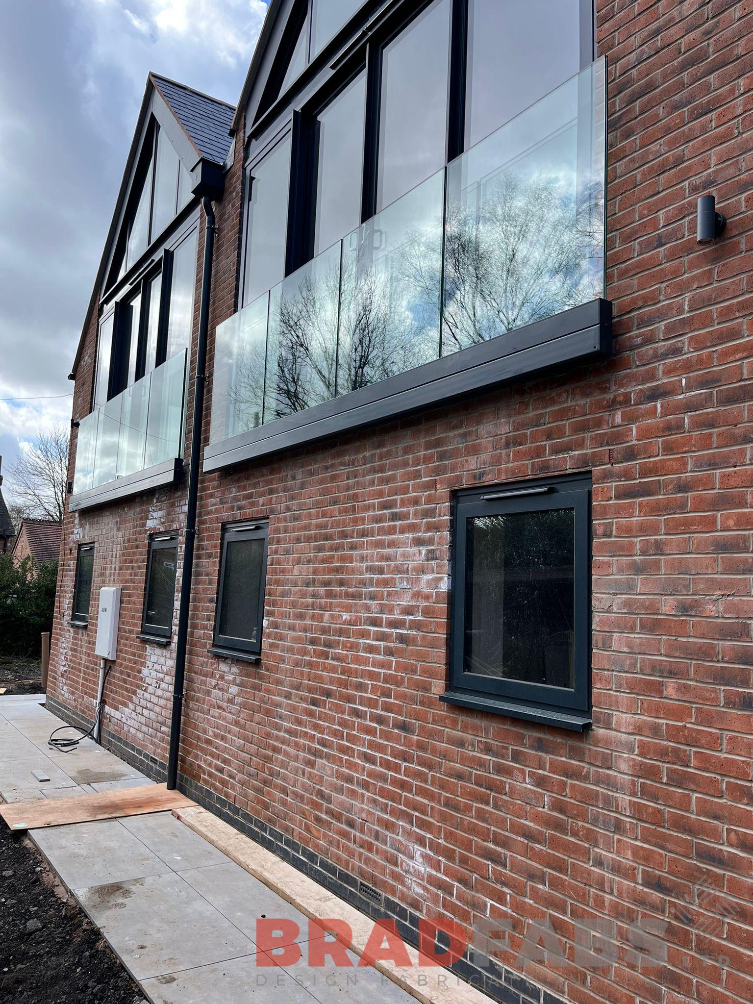 Glass balconette, designed supplied and installed by Bradfabs Ltd 