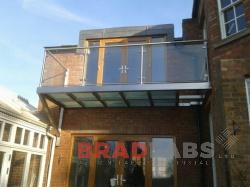 Bradfabs fabricated this stainless and glass floor balcony Rugby, UK