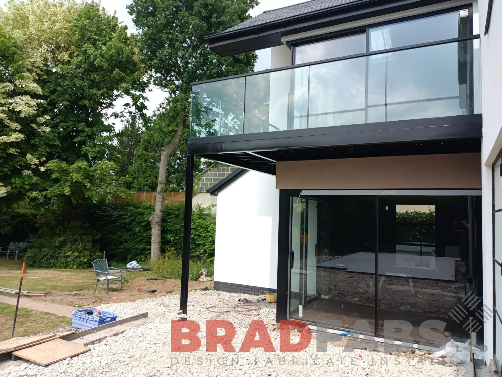 Bradfabs, balcony, steel balcony, glass balustrade, channel system infinity glass, slotted square top rail 