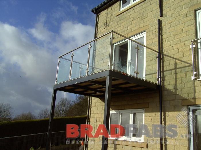 Beautiful balcony by Bradfabs, with stainless steel balustrade and glass infill panels 