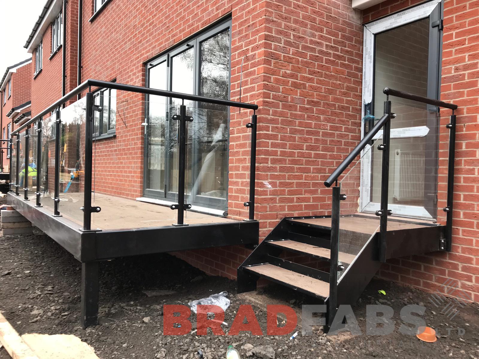 Mild steel balustrade, Galvanised balustrade, Powder coated black balustrade, glass infill panels, external stair and balcony