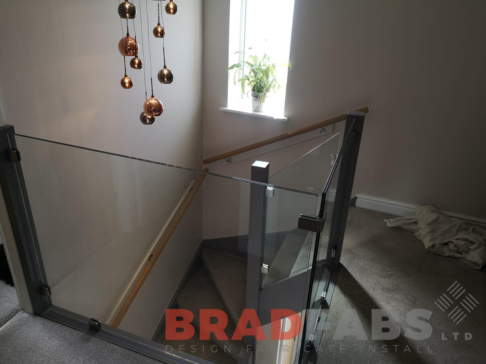 12mm toughened laminated safety infinity glass balustrade by Bradfabs 