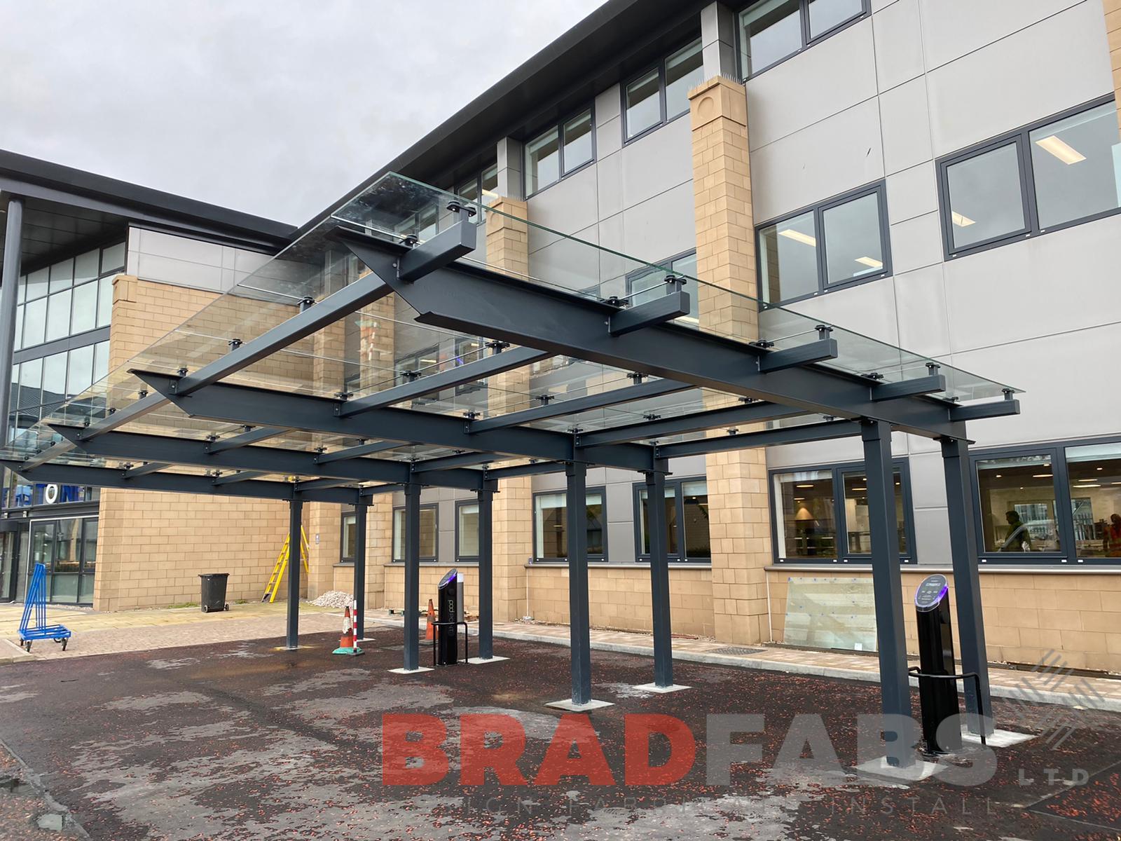 Large glass canopy for a commercial building by Bradfabs Ltd 