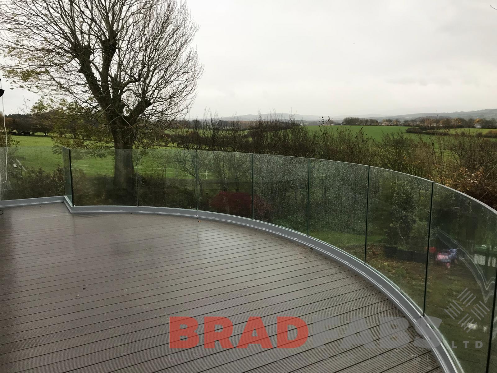 Curved infinity glass balcony with helix staircase by Bradfabs