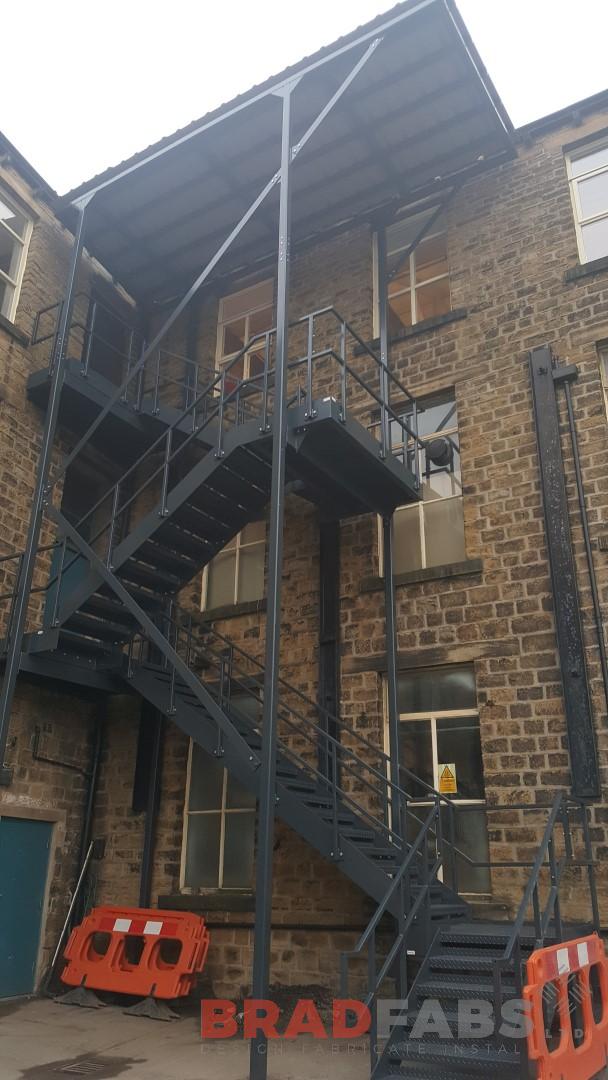 Fire escape with canopy installed and designed by Bradfabs