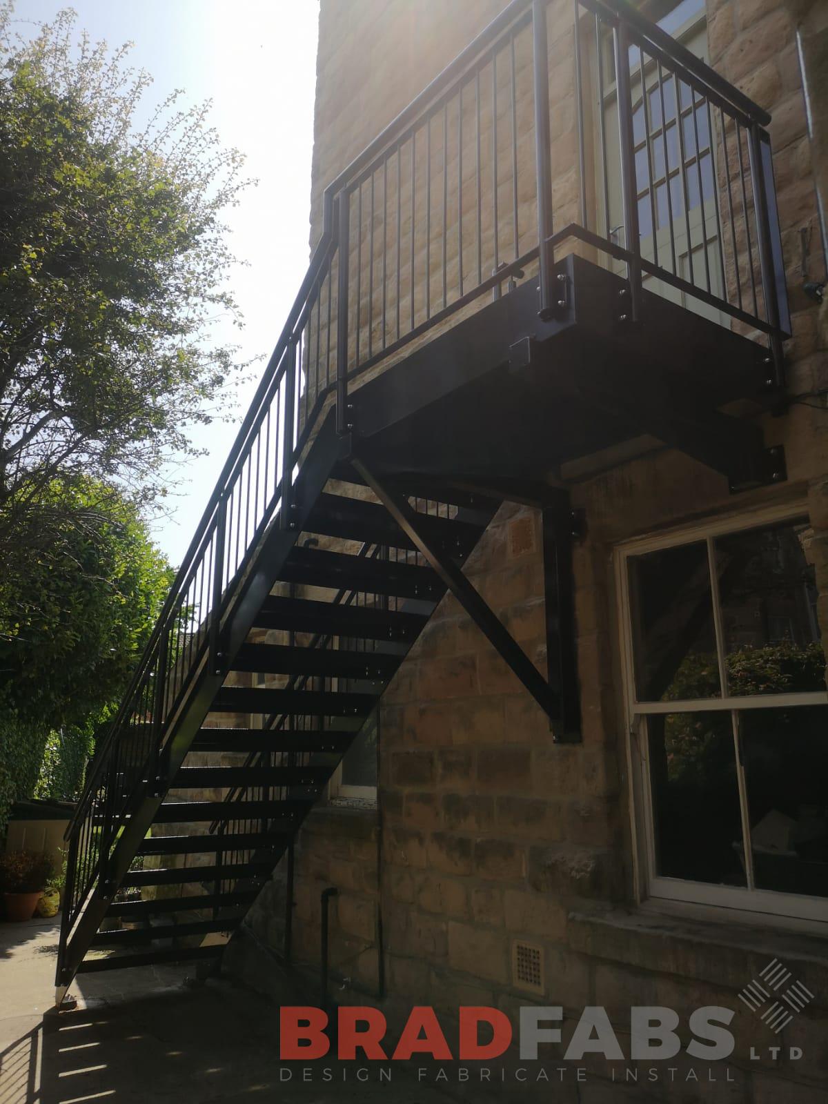 Mild steel, galvanised and powder coated fire escape with vertical bar balustrade and durbar treads by Bradfabs 