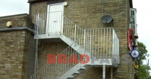 Steel external straight fire escape with two landings designed and installed by Bradfabs UK