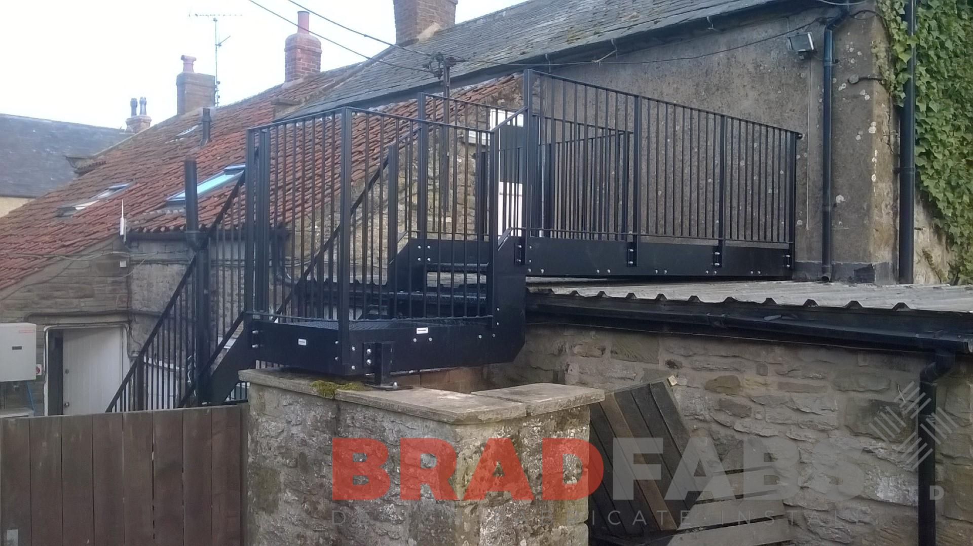 Unique designed straight fire escape manufactured and installed by Bradfabs