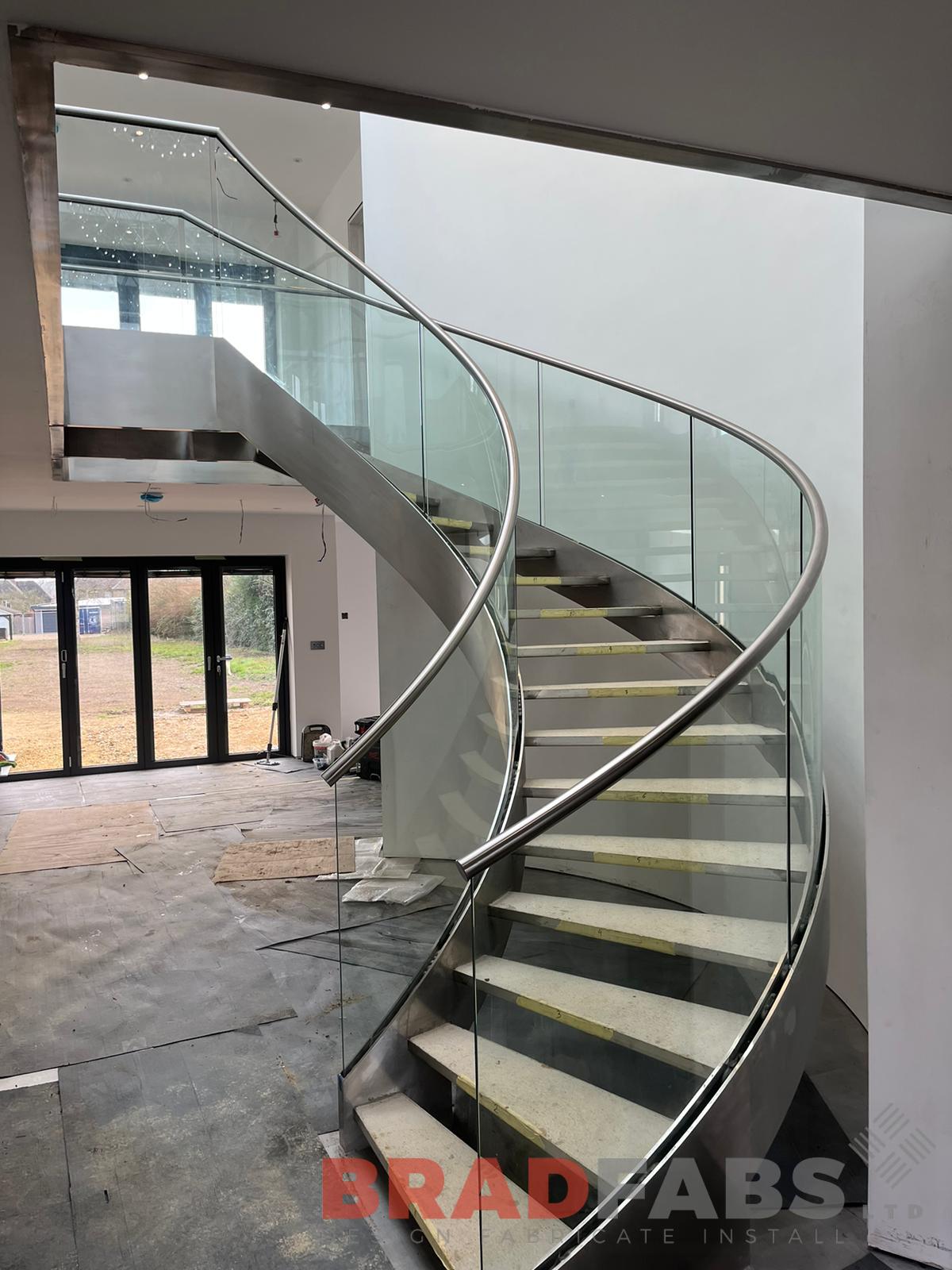 Helix staircase with stainless steel stringers by Bradfabs Ltd 