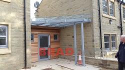 Entrance Glass Canopy installed by Bradfabds