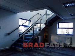 Internal staircase with glass balustrade