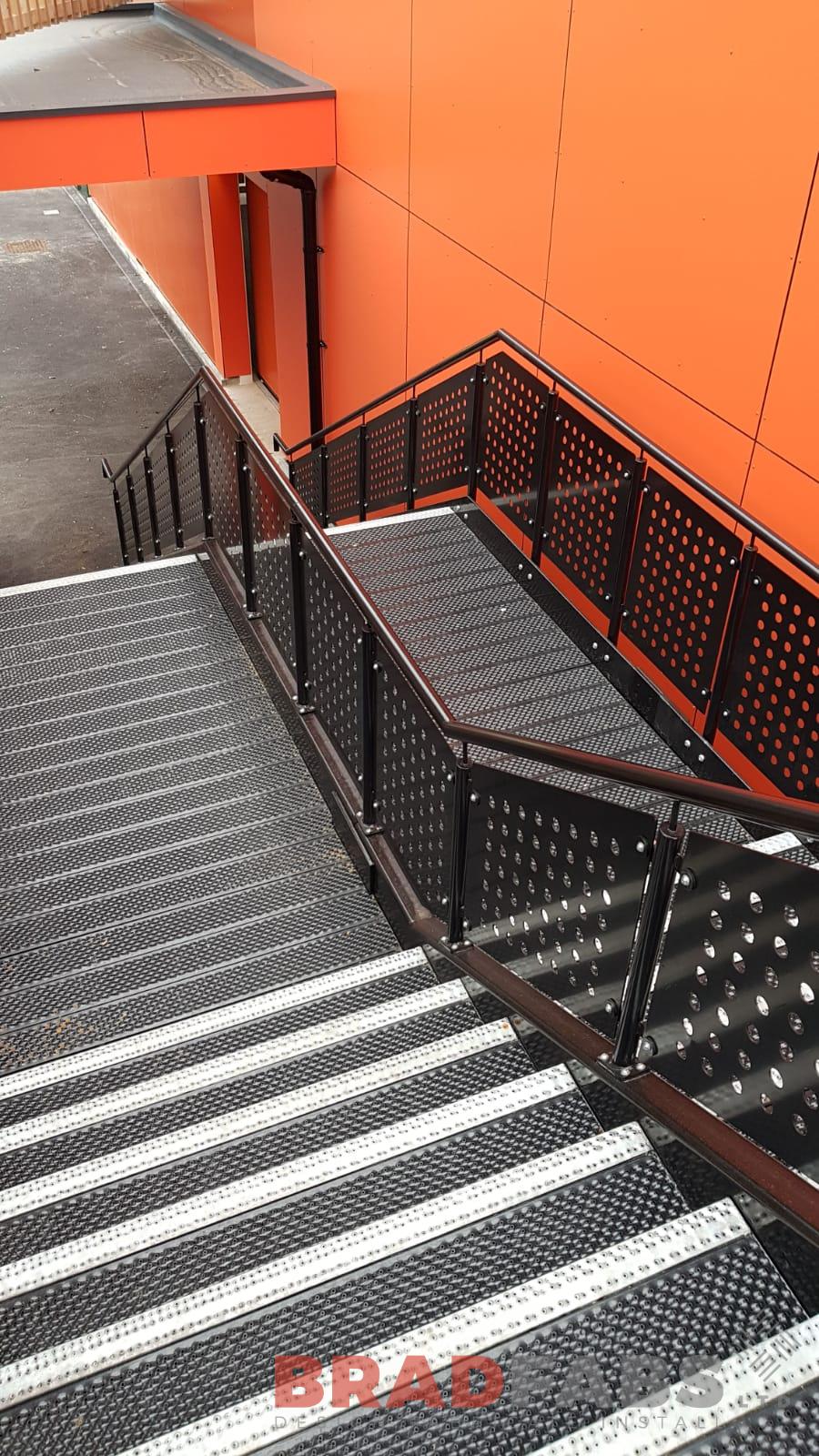 Bradfabs external straight staircase, mild steel, galvanised and powder coated with BNOP5 flooring and laser cut feature balustrade 