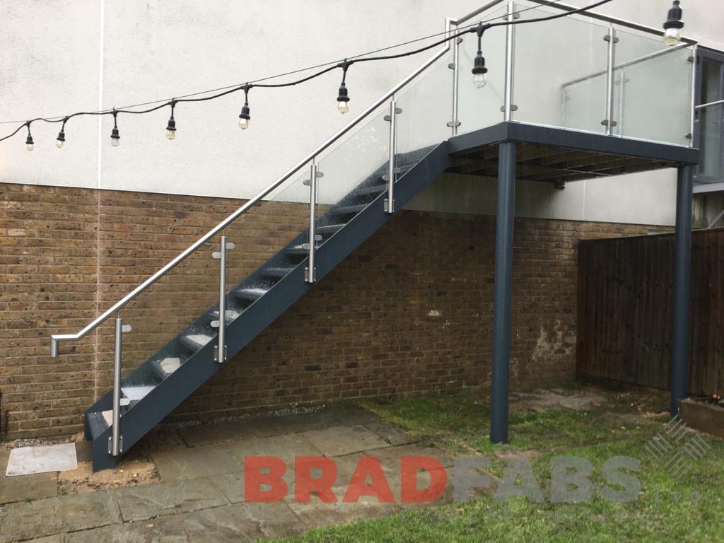 Straight external staircase, stainless steel and glass balustrade by Bradfabs Ltd 