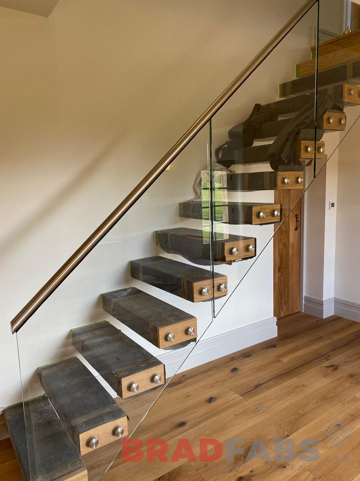 Bradfabs, floating staircase, infinity glass, stainless steel top rail, oak treads 