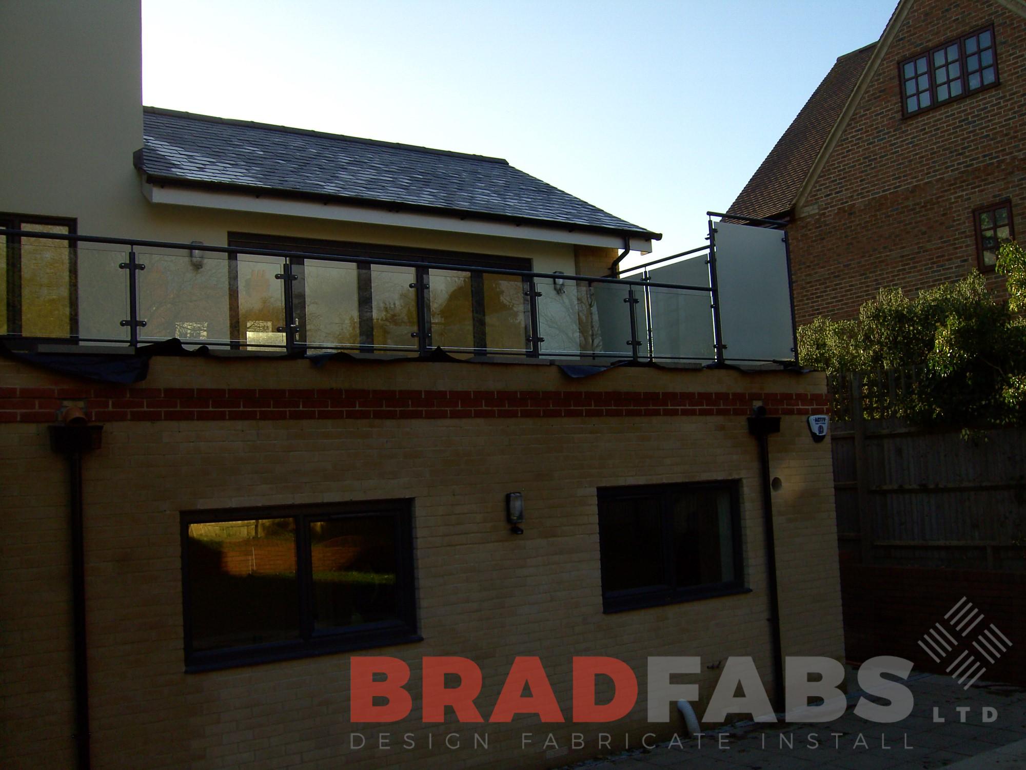 Bradfabs designed and installed this balcony balustrade with privacy glass at a domestic property UK